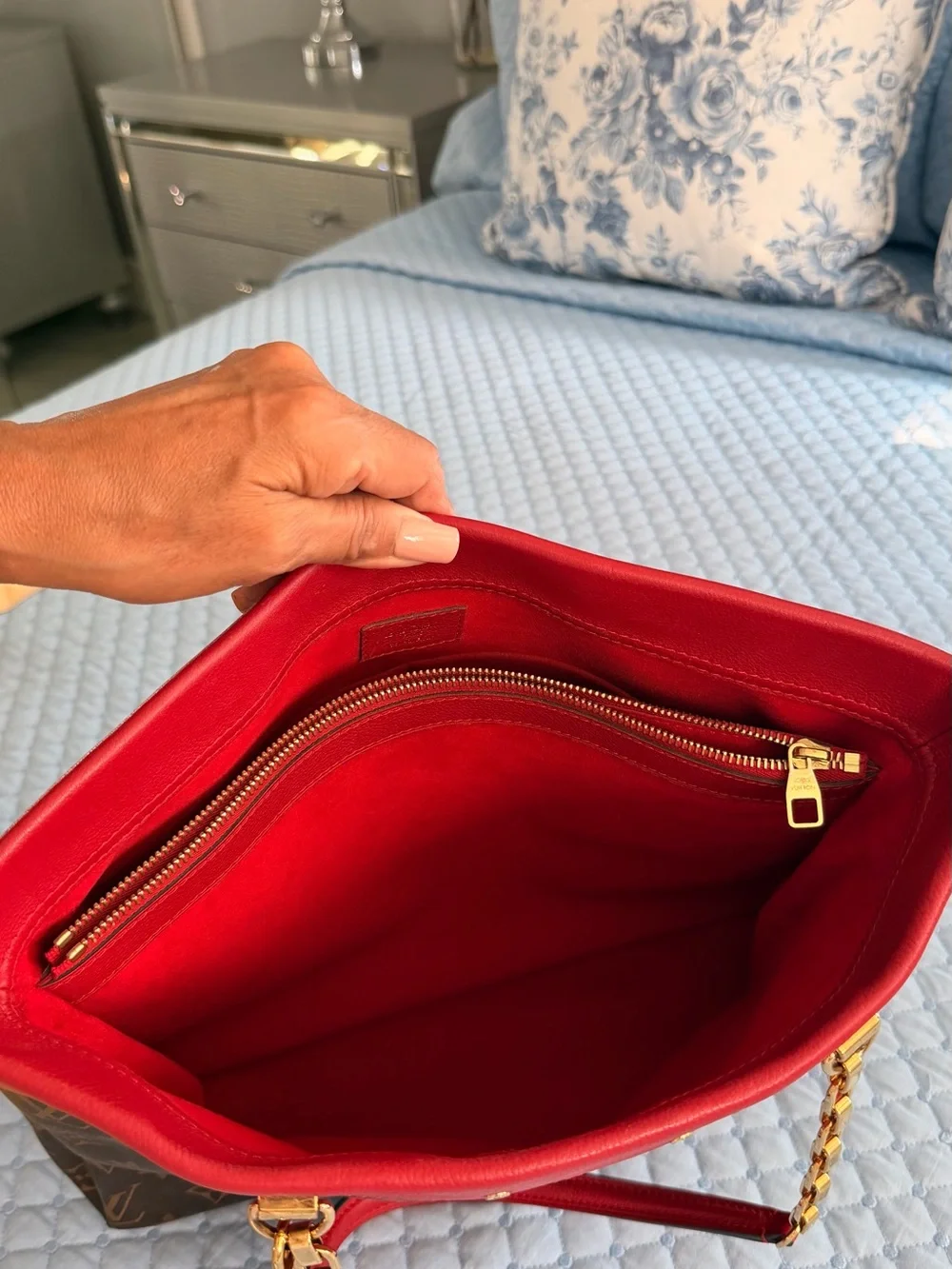 Louis Vuitton Pallas Shopper Tote in Monogram with Red trim.